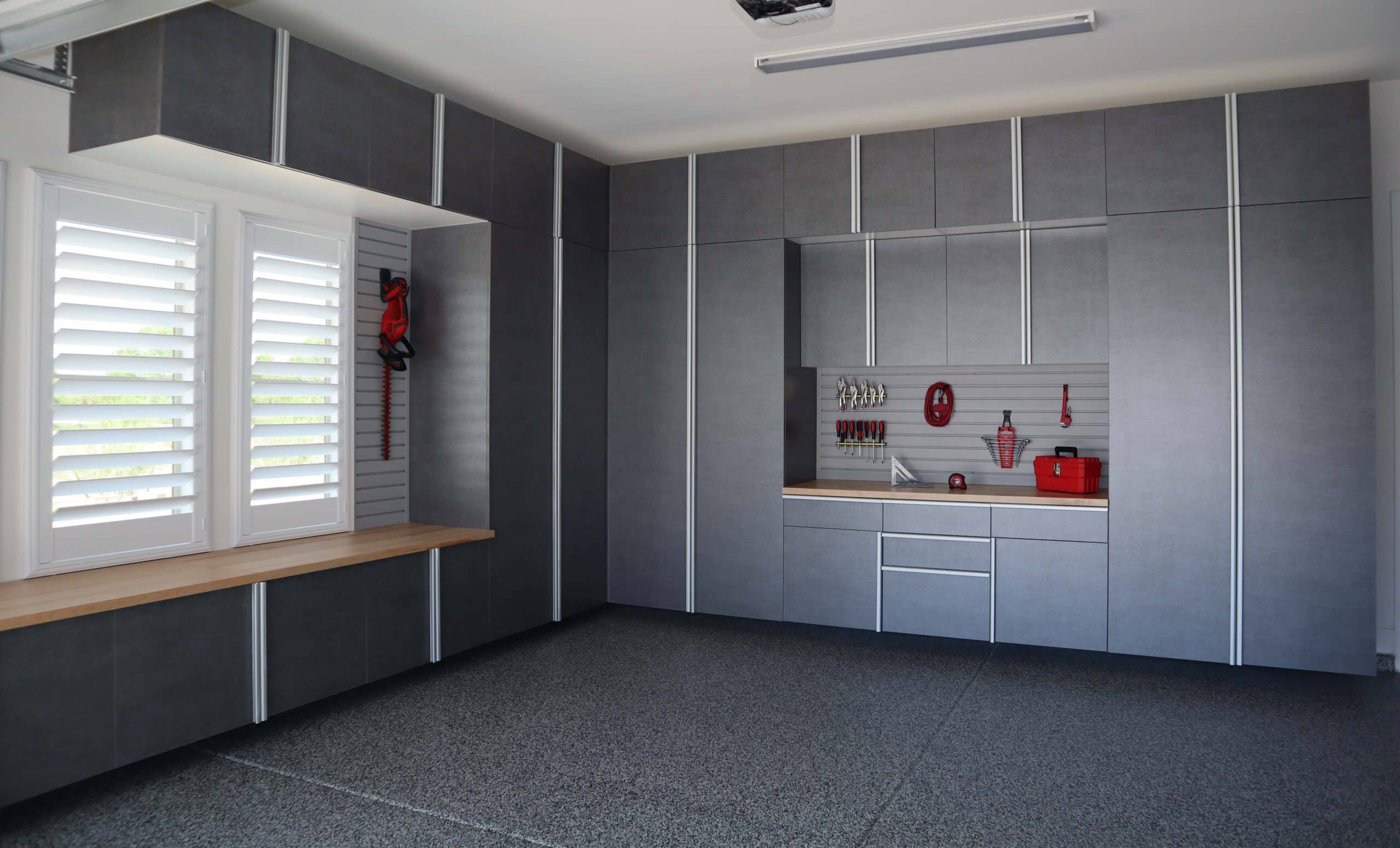 Image showcasing a fully finished Garage Flooring design by Modern Closet in Saskatoon