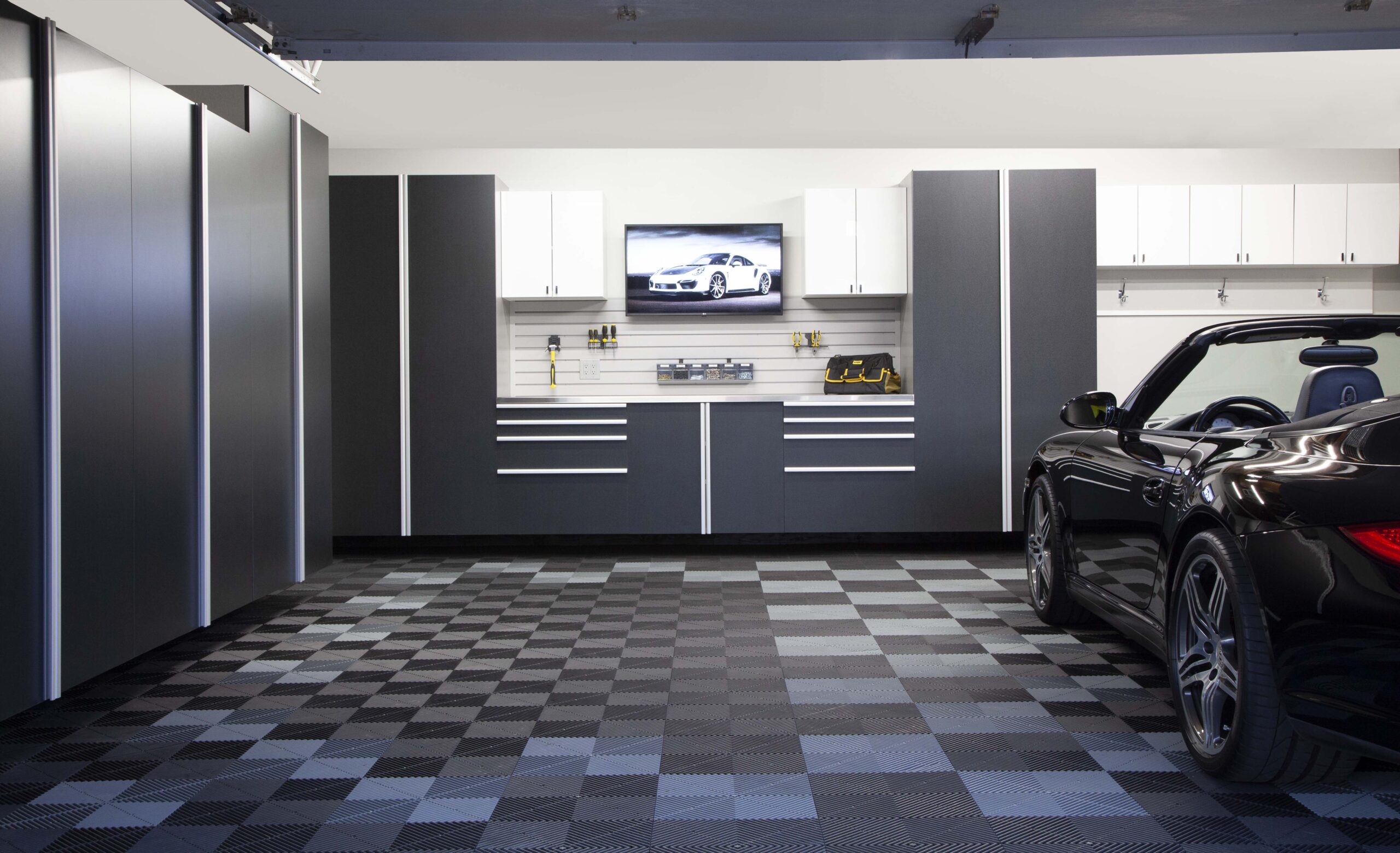 Image showcasing a fully finished Garage Storage, Flooring & Accessories design by Modern Closet in Saskatoon