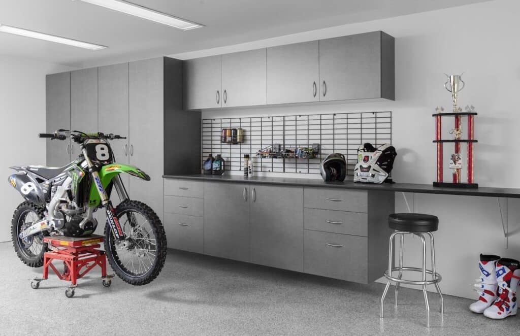 Image of a fully finished Pewter-Cabinets-Ebony-Star-Workbench-Silverado-Floor-Dirt-Bike-Abbott-May-2013
