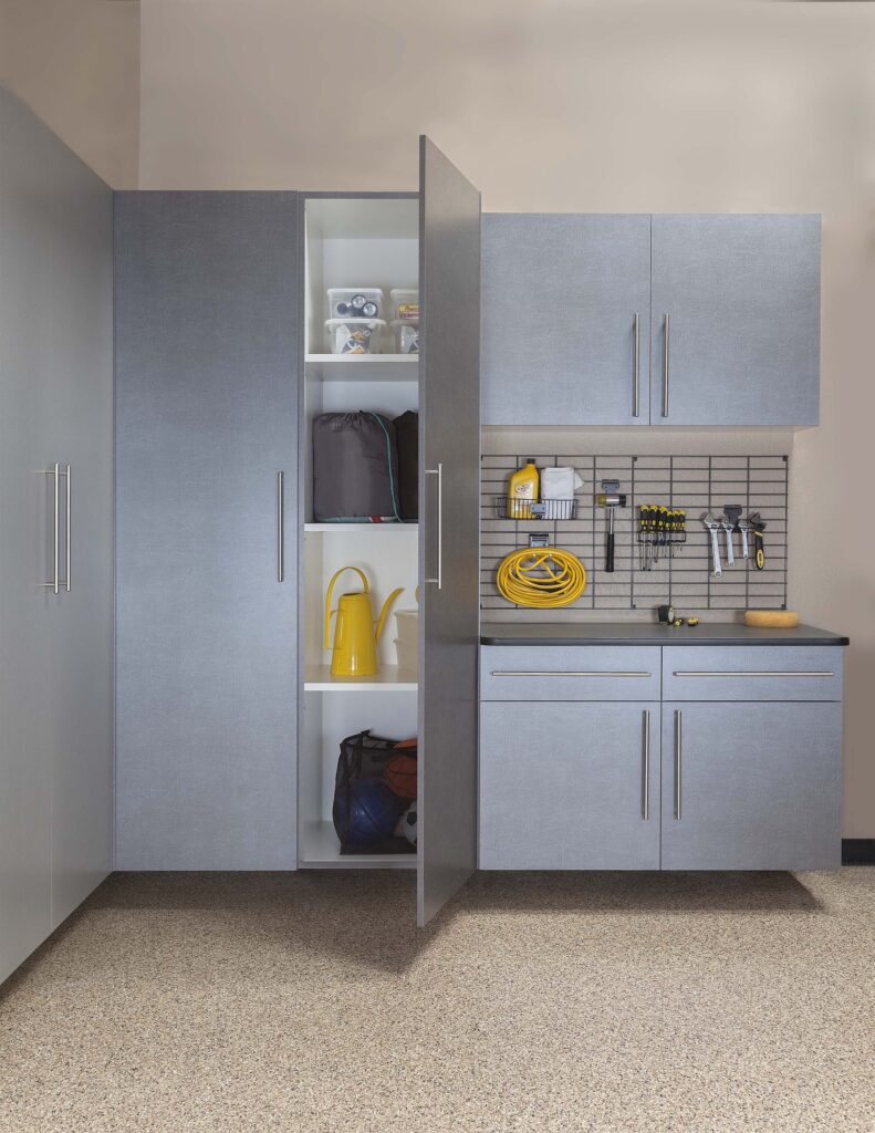 Image of a fully finished Pewter-Cabinets-Ebony-Workbench-Gridwall-Sedona-Floor-Door-Open-Feb-2013