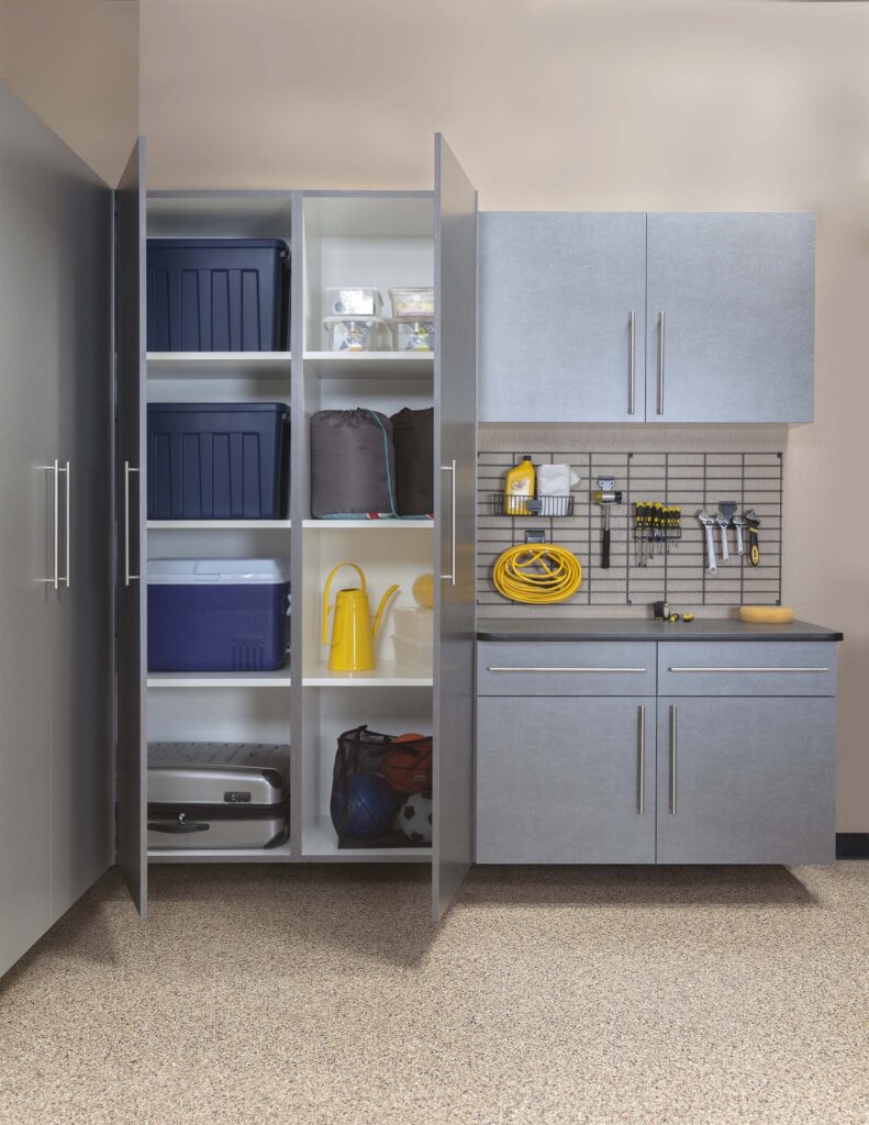 Image of a fully finished Pewter-Cabinets-Ebony-Workbench-Gridwall-Sedona-Floor-Two-Doors-Open-Feb-2013