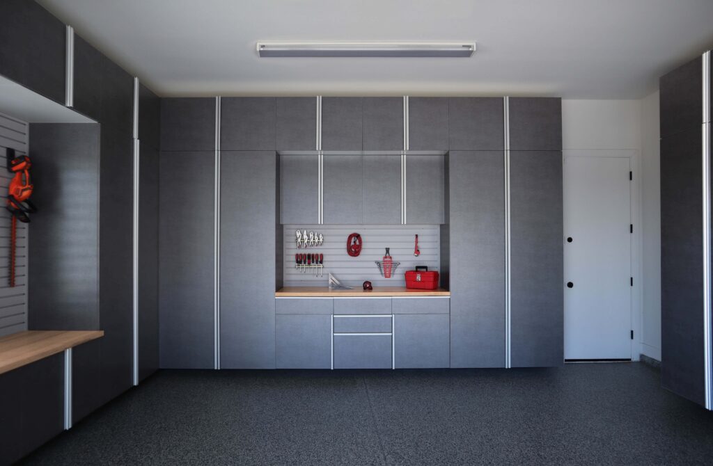 Image of a fully finished Pewter-Cabinets-with-Butcher-Block-Countertop-and-Grey-Slatwall-June-2021