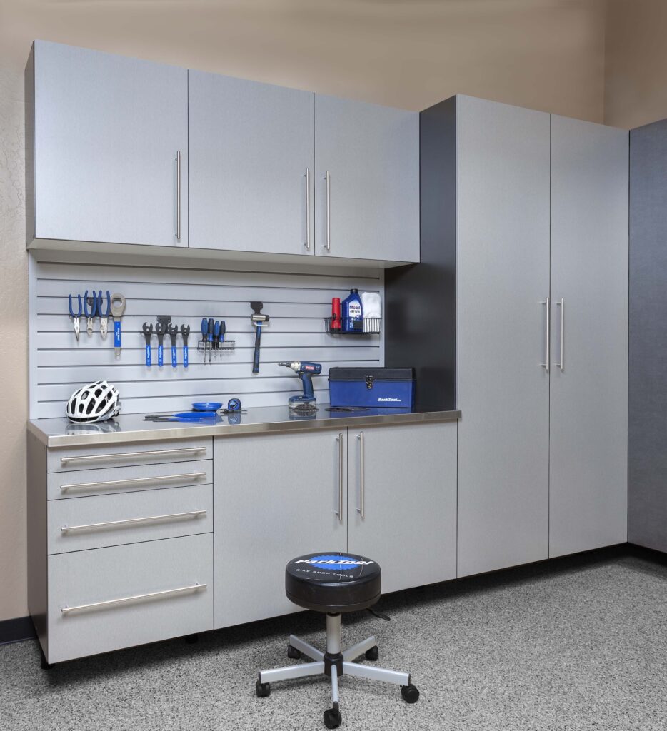 Image of a fully finished Silver-Cropped-Stianless-Workbench-with-Gray-Slatwall-Smoke-Floor-Feb-2013